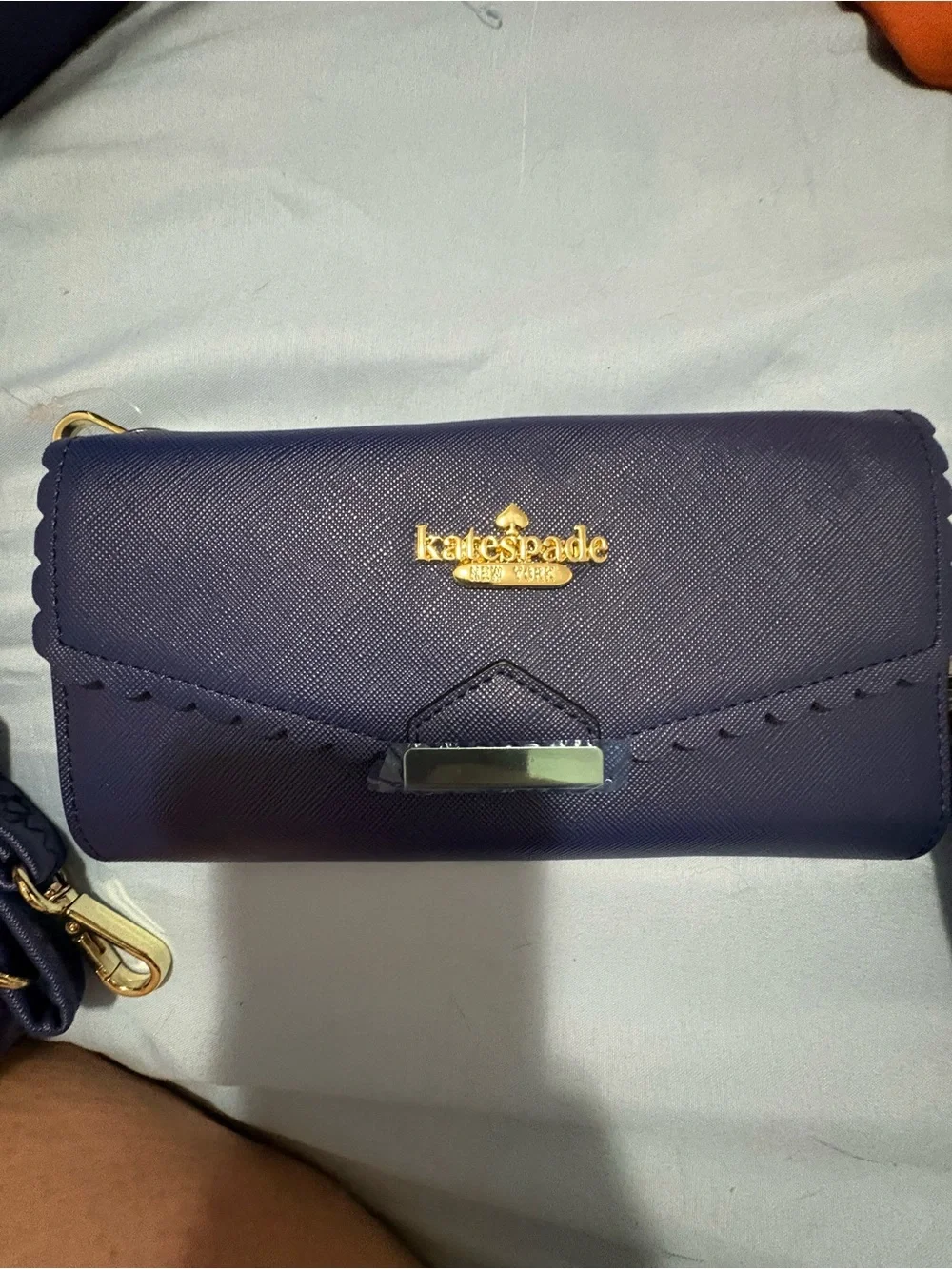 Structured Navy Fashion Tote with Gold Chain Accent and Wallet.